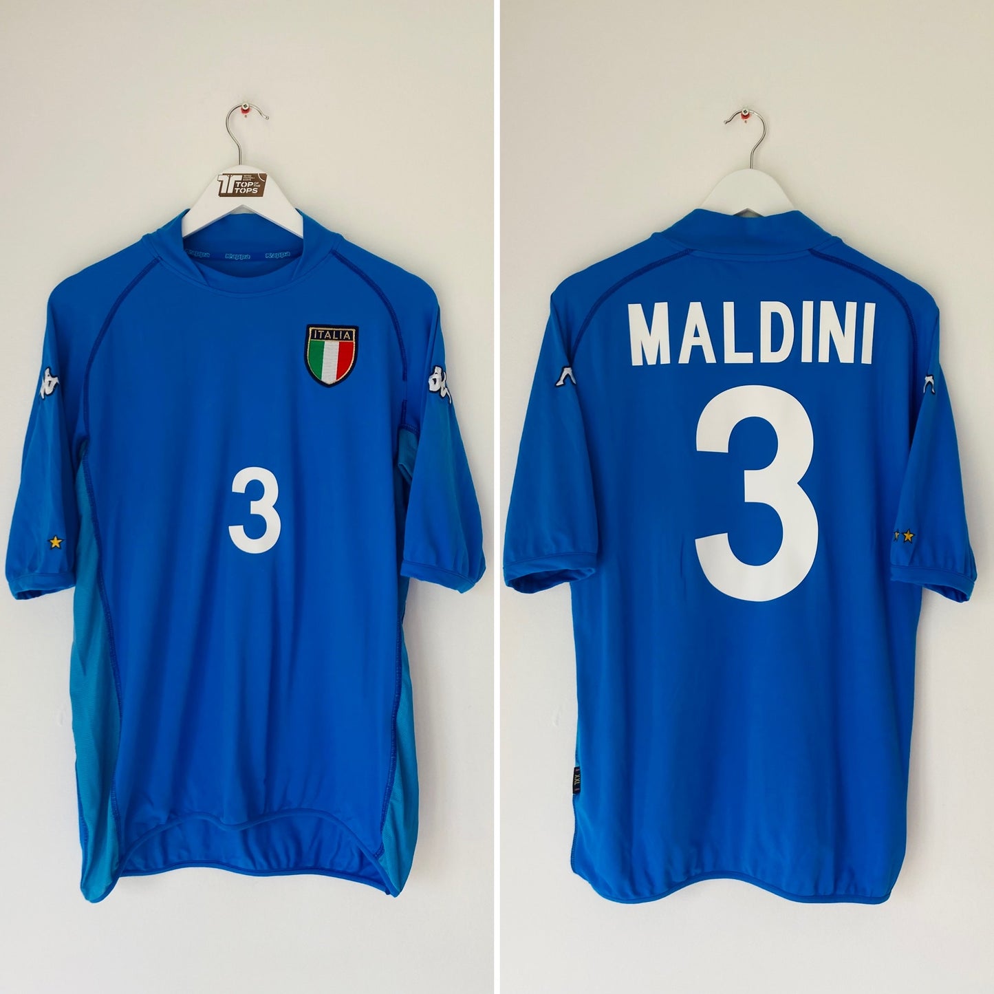 Italy home football shirt
W/C 2002 Maldini XXL (large)