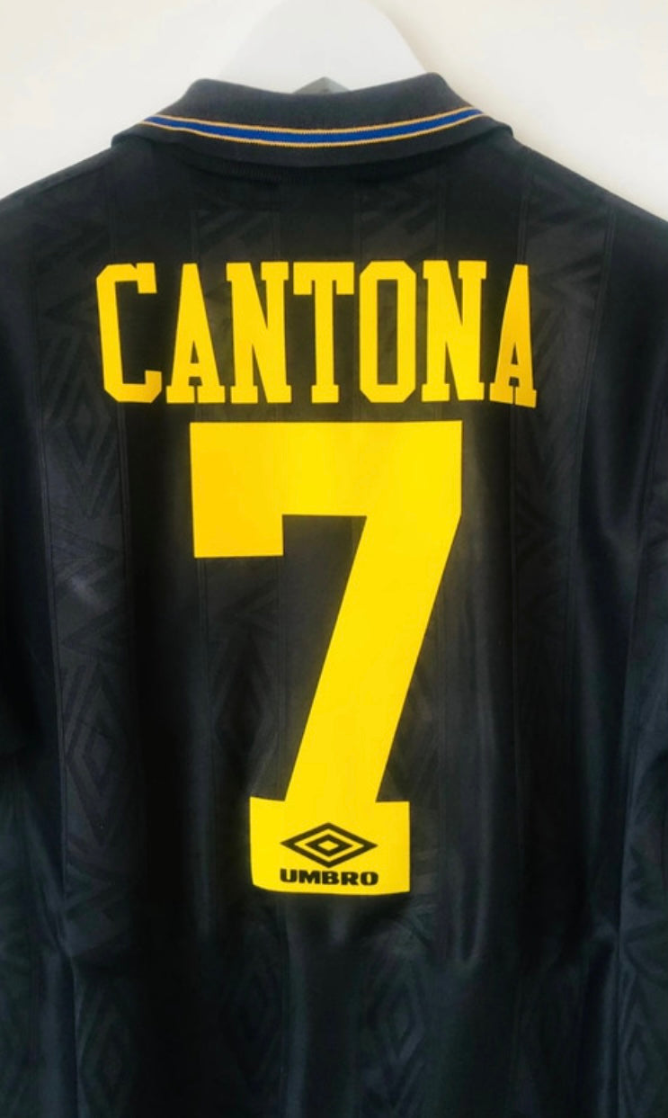 Manchester United away football shirt
Cantona
