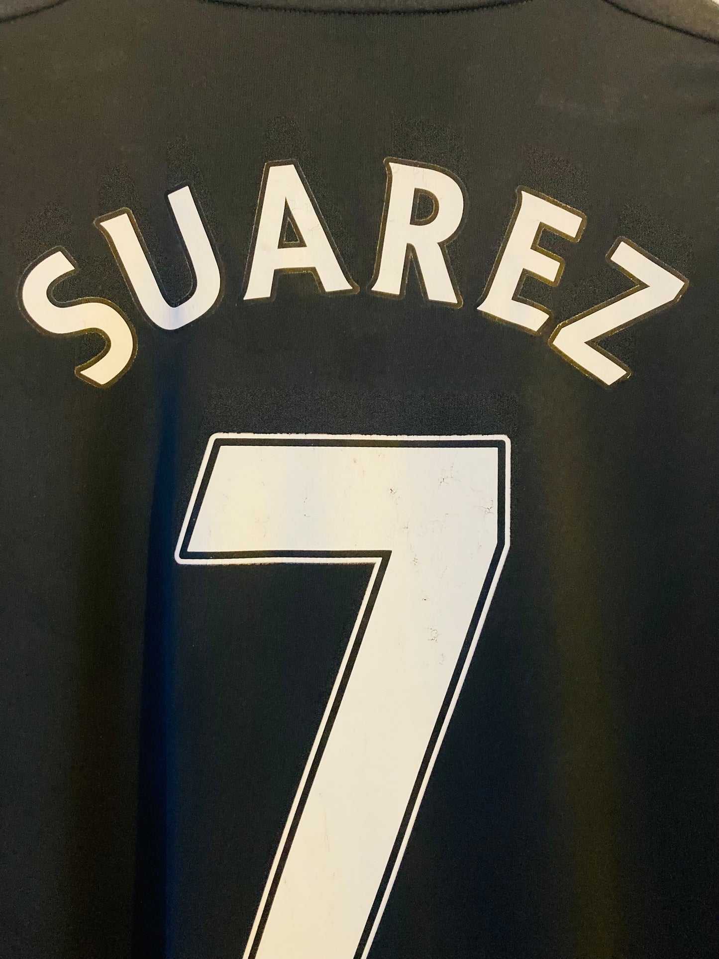 Liverpool away football shirt
2011/12 Suarez Large