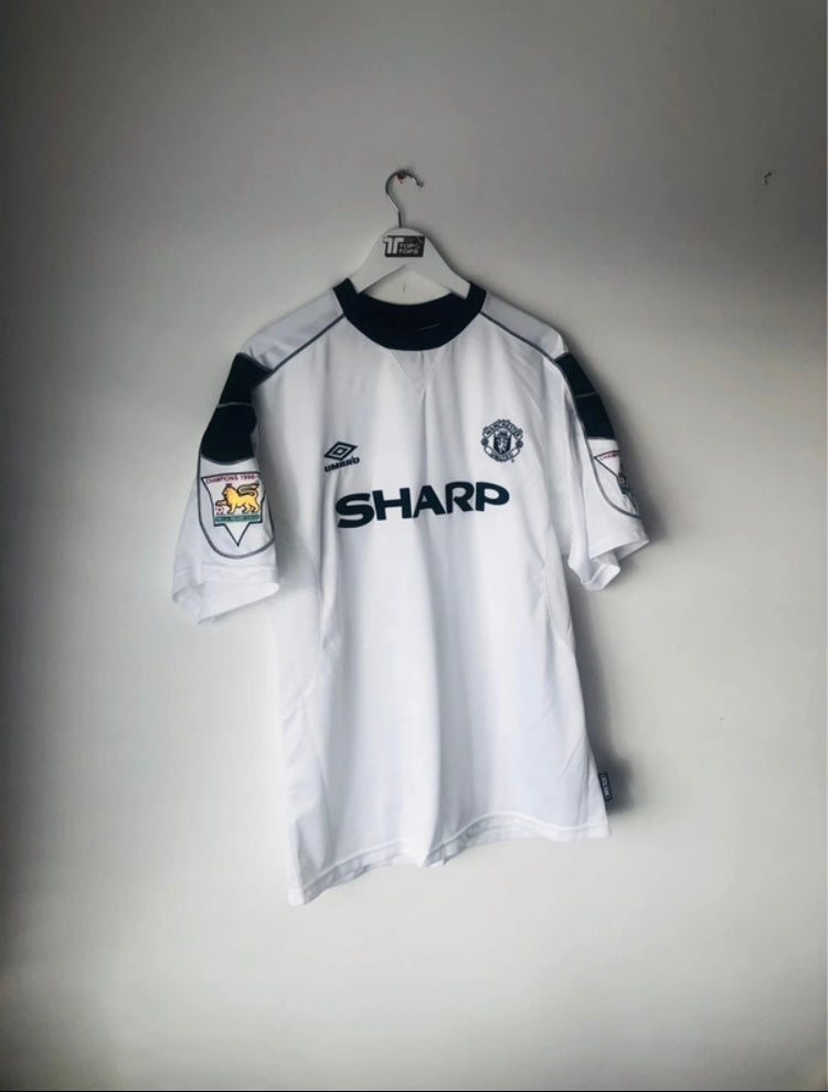 Manchester United away football shirt
Stam Large 1999/2000