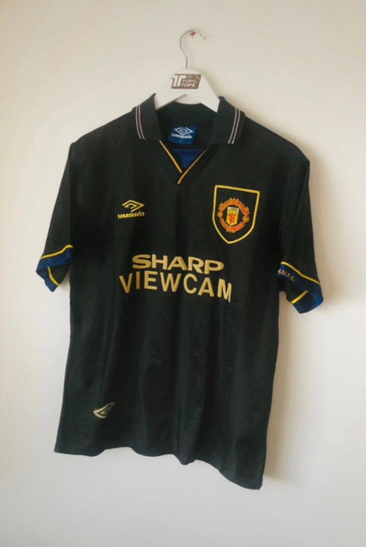 Manchester United away football shirt
Cantona