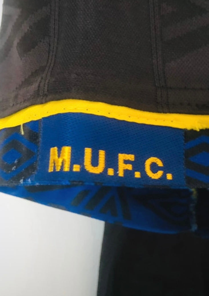 Manchester United away football shirt
Cantona