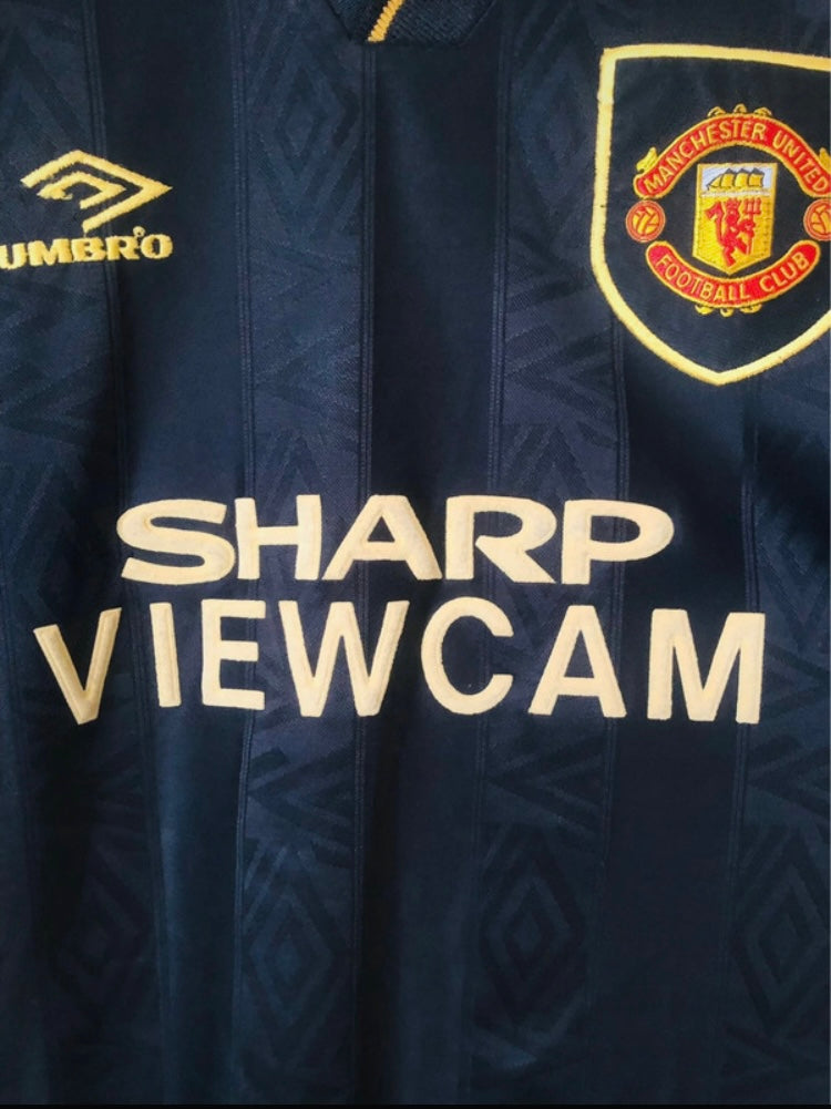 Manchester United away football shirt
Cantona