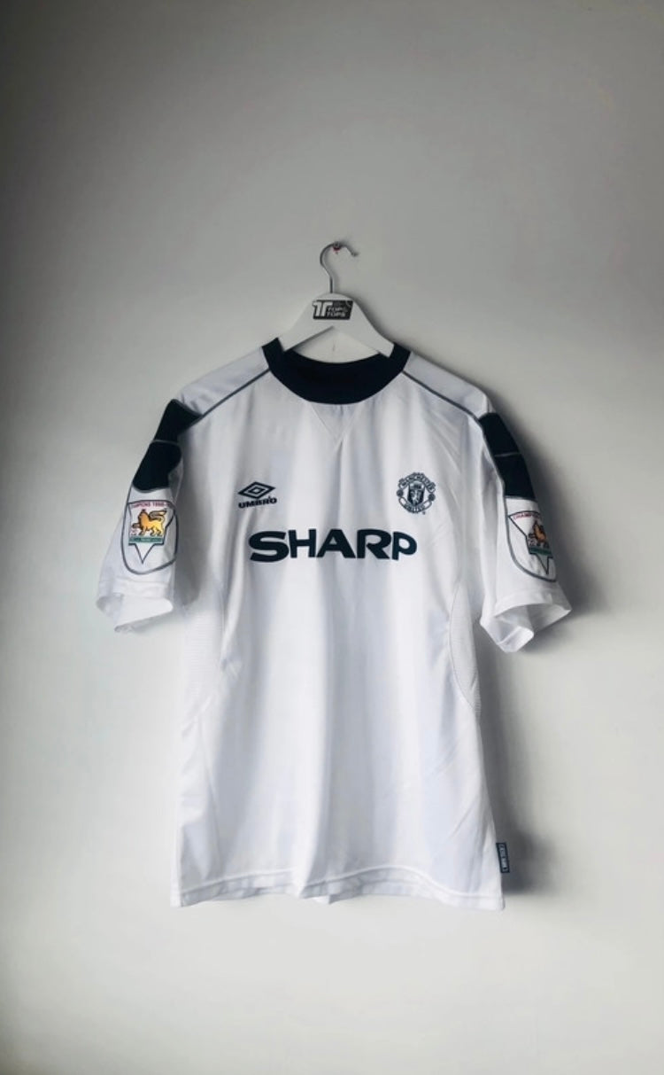 Manchester United away football shirt
Stam Large 1999/2000
