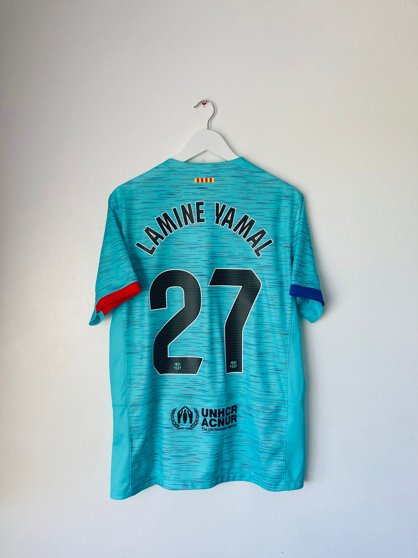 Barcelona third football shirt
2023/24 Lamine Yamal Large