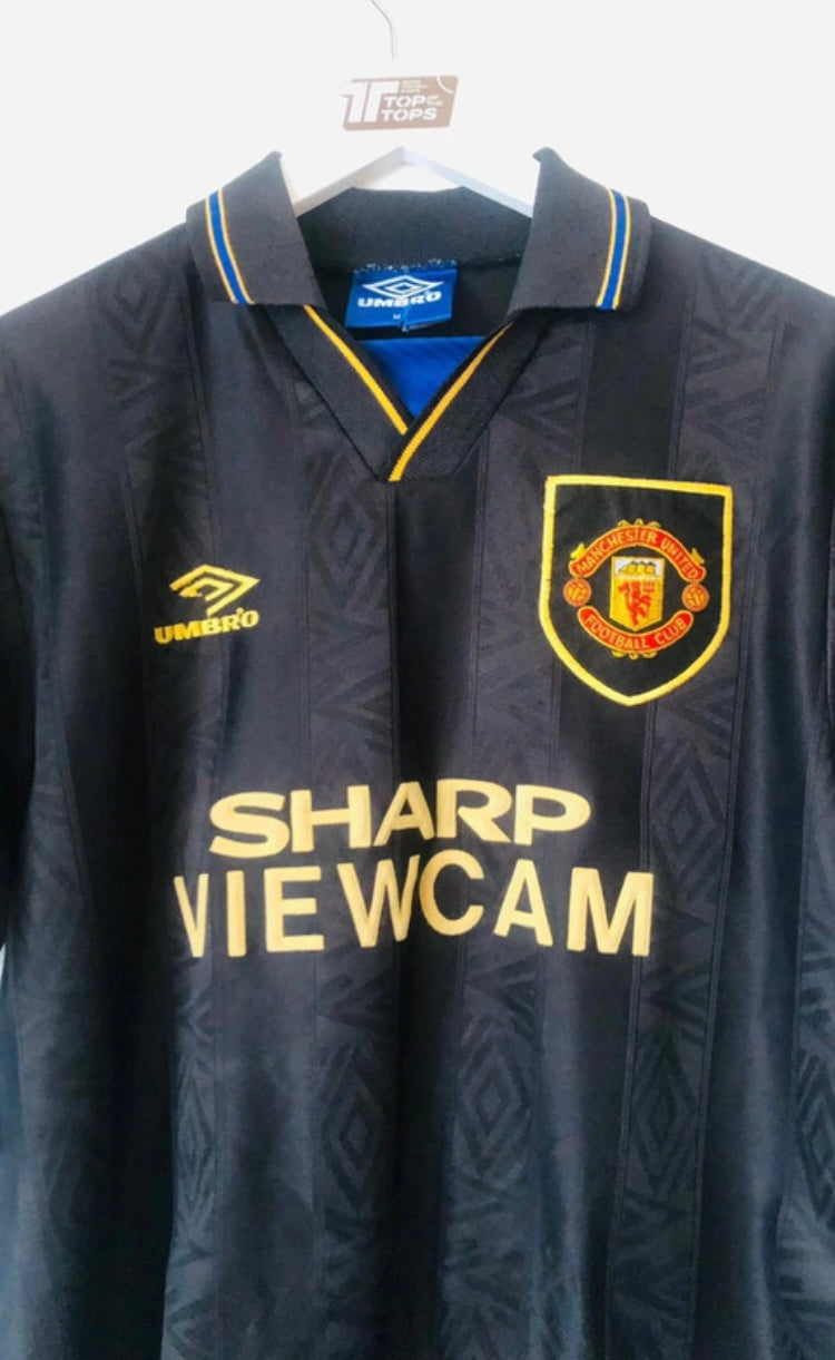 Manchester United away football shirt
Cantona