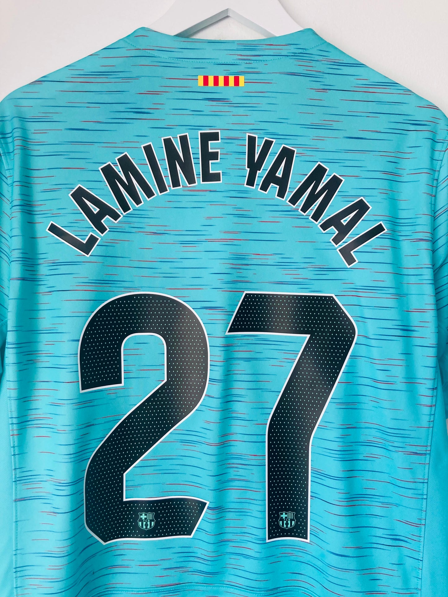 Barcelona third football shirt
2023/24 Lamine Yamal Large
