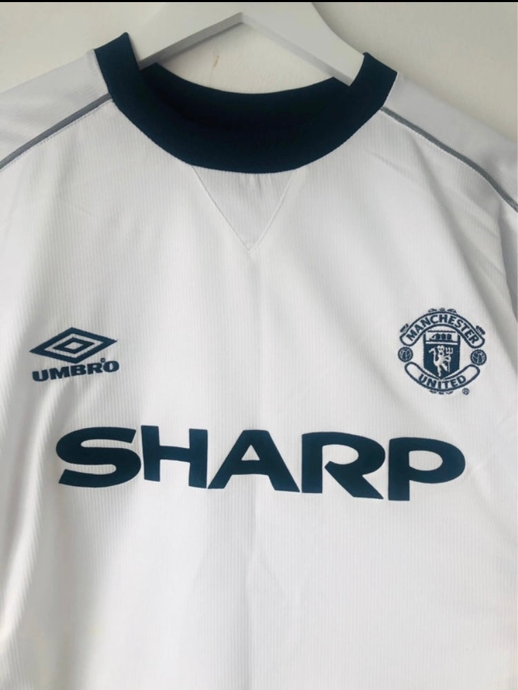 Manchester United away football shirt
Stam Large 1999/2000