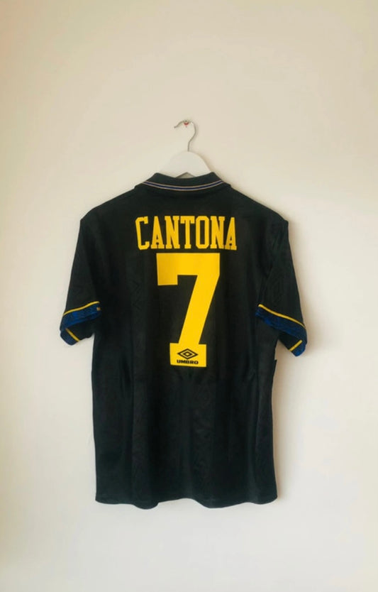 Manchester United away football shirt
Cantona