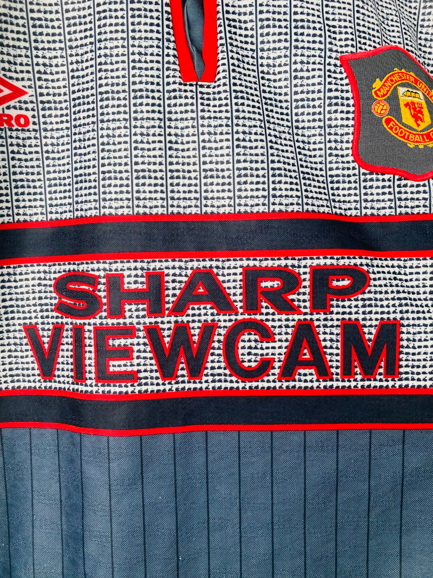 Manchester United away football shirt
1995/96 Beckham Large