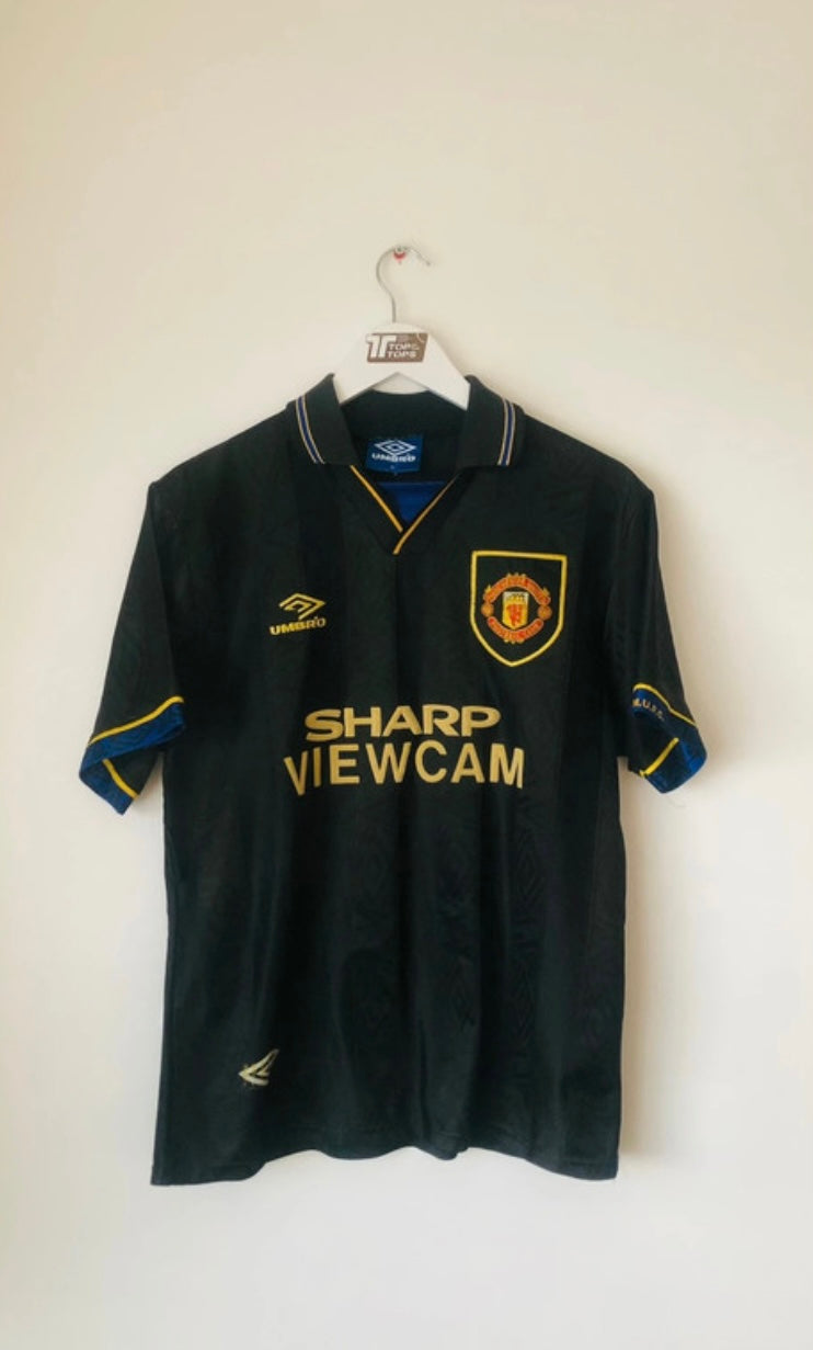 Manchester United away football shirt

Cantona