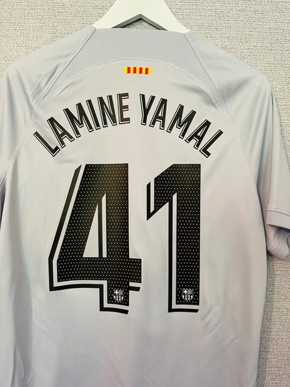Barcelona third football shirt
2022/23 Lamine Yamal Medium