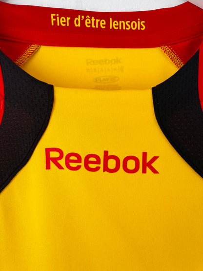 Lens home football shirt
2010/11 Varane XL