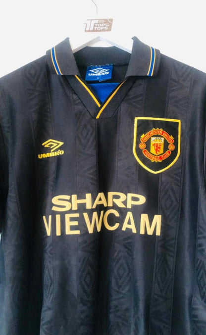 Manchester United away football shirt

Cantona