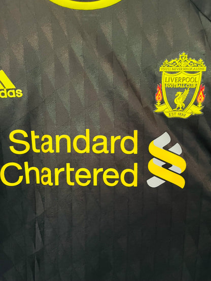 Liverpool third football shirt
2010/12 Suarez Large